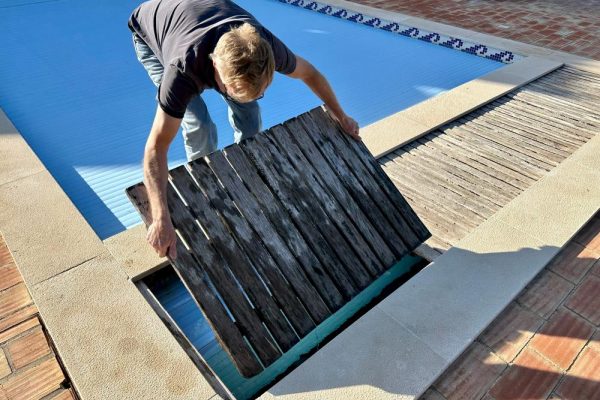 home inspector checking a pool for safety
